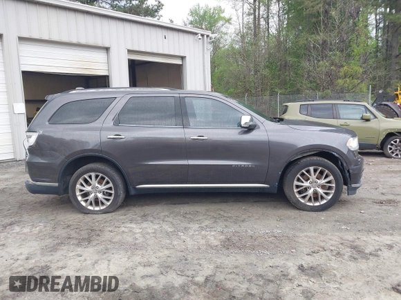 2014 Dodge Durango Citadel with VIN 1C4RDJEG1EC530474, listed as a IAAI auction lot 41961801 with 165,625 mi miles and . Bid and sale history available at DreamBid. Image 13.