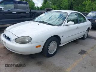 1999 Mercury Sable LS Premium Group with VIN 1MEFM53S3XG637697, listed as a IAAI auction lot 42283365 with 187,758 mi miles and . Bid and sale history available at DreamBid. Image 2.
