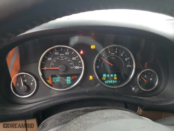 2012 Jeep Wrangler Unlimited Sahara with VIN 1C4HJWEG0CL163310, listed as a Copart auction lot 48972825 with 125,934 mi miles and Salvage Title. Bid and sale history available at carsss.com. Image 9.