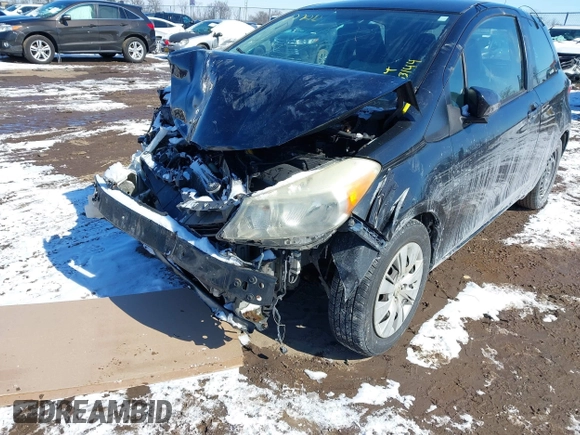 2012 Toyota Yaris L with VIN JTDJTUD33CD520102, listed as a IAAI auction lot 41621530 with 133,144 mi miles. Bid and sale history available at carsss.com. Image 6.