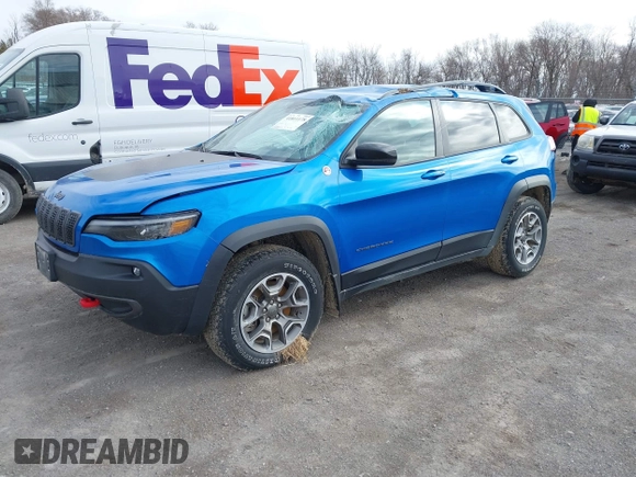 2022 Jeep Cherokee Trailhawk z VIN 1C4PJMBX1ND539319, wystawiony jako IAAI lot #41811178 z przebiegiem 49 922 mil mil oraz . Historia ofert i sprzedaży dostępna na DreamBid. Obrazek 18.