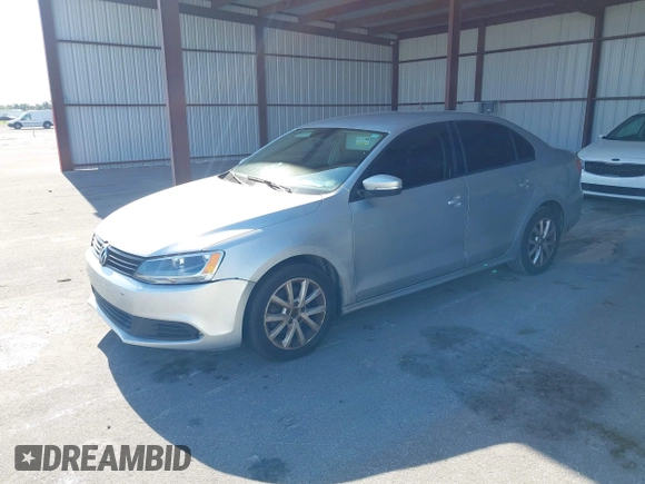 2012 Volkswagen Jetta Sedan SE w/Convenience with VIN 3VWDX7AJ6CM108473, listed as a IAAI auction lot 42035336 with 175,085 mi miles. Bid and sale history available at carsss.com. Image 2.