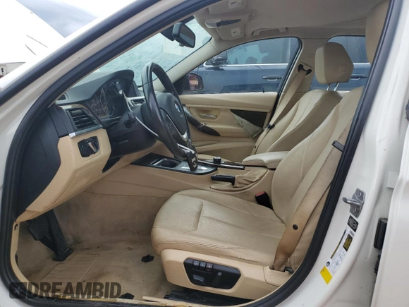2014 BMW 3 Series 328i with VIN WBA3A5C59EP601899, listed as a Copart auction lot 61430675 with 205,396 mi miles and Salvage title. Bid and sale history available at DreamBid. Image 7.
