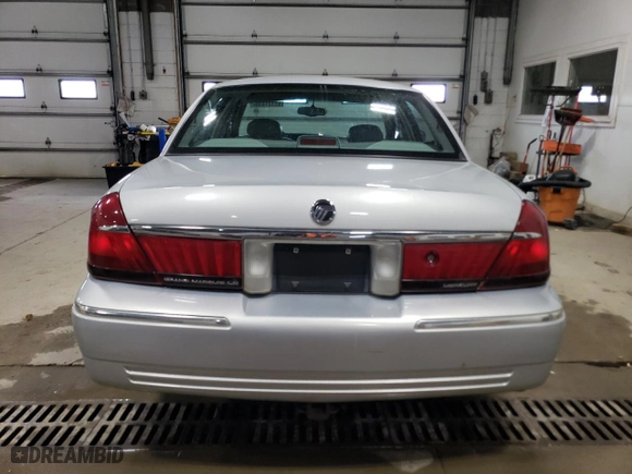 1999 Mercury Grand Marquis LS with VIN 2MEFM75W9XX710903, listed as a Copart auction lot 51171335 with 0 mi miles and Salvage Title. Bid and sale history available at carsss.com. Image 6.
