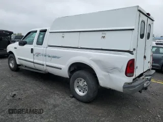 1999 Ford F-250 XL with VIN 1FTNX20L3XEA81807, listed as a Copart auction lot 58036385 with 251,614 mi miles and Salvage title. Bid and sale history available at DreamBid. Image 2.