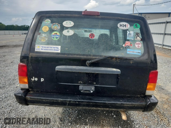1999 Jeep Cherokee z VIN 1J4FF28P4XL560533, wystawiony jako Copart lot #59180605 z przebiegiem 190 262 mil mil oraz Czysty tytuł • Clean title. Historia ofert i sprzedaży dostępna na DreamBid. Obrazek 6.