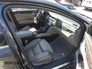 2013 Cadillac XTS Premium with VIN 2G61S5S33D9113653, listed as a IAAI auction lot 41837117 with 101,049 mi miles and . Bid and sale history available at DreamBid. Image 5.