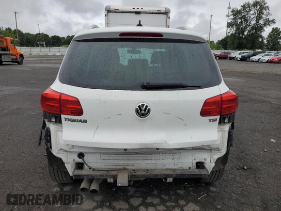 2017 Volkswagen Tiguan Wolfsburg Edition with VIN WVGRV7AX0HK003389, listed as a Copart auction lot 59709615 with 88,491 mi miles and Salvage title. Bid and sale history available at DreamBid. Image 6.