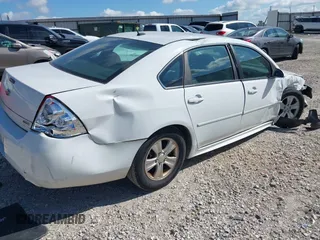 2014 Chevrolet Impala LS with VIN 2G1WA5E37E1189080, listed as a IAAI auction lot 42607058 with 128,337 mi miles and . Bid and sale history available at DreamBid. Image 4.