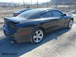 2014 Dodge Charger RT 100th Anniversary with VIN 2C3CDXCT4EH261977, listed as a IAAI auction lot 41815504 with 92,478 mi miles. Bid and sale history available at carsss.com. Image 4.