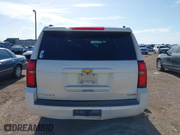 2015 Chevrolet Tahoe LT with VIN 1GNSCBKC3FR631632, listed as a IAAI auction lot 42532555 with 235,904 mi miles and . Bid and sale history available at DreamBid. Image 16.