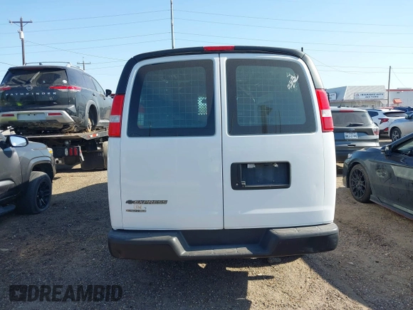 2018 Chevrolet Express Cargo Van with VIN 1GCWGAFP0J1182701, listed as a IAAI auction lot 42014825 with 206,702 mi miles. Bid and sale history available at carsss.com. Image 16.