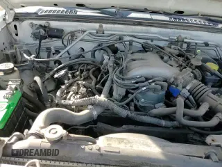 2004 Nissan Frontier XE with VIN 1N6ED27T24C429793, listed as a Copart auction lot 87256024 with 219,611 mi miles and Clean title. Bid and sale history available at DreamBid. Image 13.