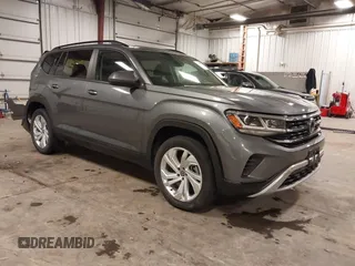 2021 Volkswagen Atlas SE with VIN 1V2KR2CA5MC606590, listed as a IAAI auction lot 42383813 with 45,087 mi miles and . Bid and sale history available at DreamBid. Image 1.