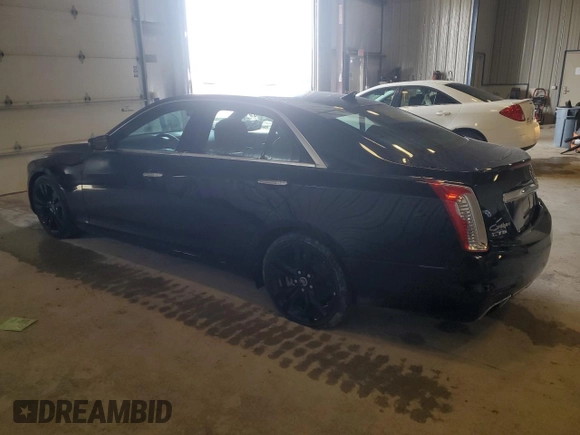 2014 Cadillac CTS Vsport Premium RWD z VIN 1G6AV5S85E0171942, wystawiony jako Copart lot #51222225 z przebiegiem 203 417 mil mil oraz Nie do naprawy. Historia ofert i sprzedaży dostępna na DreamBid. Obrazek 2.