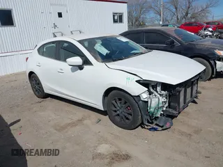 2014 Mazda 3 i Touring with VIN JM1BM1L75E1100432, listed as a IAAI auction lot 41897584 with 149,628 mi miles and . Bid and sale history available at DreamBid. Image 1.