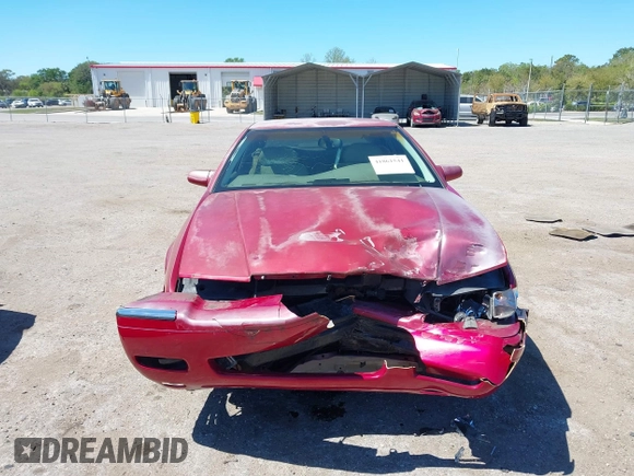 2002 Cadillac Eldorado ESC z VIN 1G6EL12Y72B102153, wystawiony jako IAAI lot #41861541 z przebiegiem 91 273 mil mil oraz . Historia ofert i sprzedaży dostępna na DreamBid. Obrazek 12.
