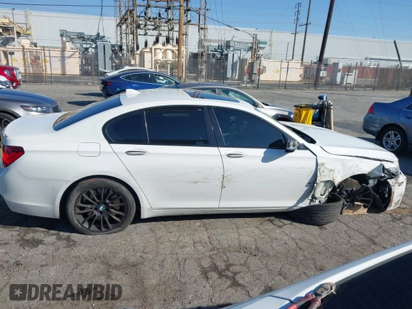 2014 BMW 7 Series 750i с VIN WBAYA8C58ED228444, выставлен на аукционе IAAI как лот 41665037 с пробегом 165 663 миль миль и . История ставок и продаж доступна на DreamBid. Изображение 13.