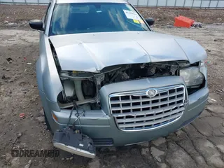 2005 Chrysler 300 with VIN 2C3JA43R05H137403, listed as a IAAI auction lot 41399519 with 135,044 mi miles. Bid and sale history available at carsss.com. Image 6.