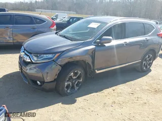 2019 Honda CR-V Touring with VIN 7FARW1H98KE007592, listed as a IAAI auction lot 41711030 with 58,118 mi miles. Bid and sale history available at carsss.com. Image 6.