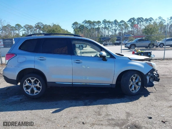 2017 Subaru Forester Touring with VIN JF2SJAWC7HH523883, listed as a IAAI auction lot 41595014 with 74,654 mi miles. Bid and sale history available at carsss.com. Image 14.