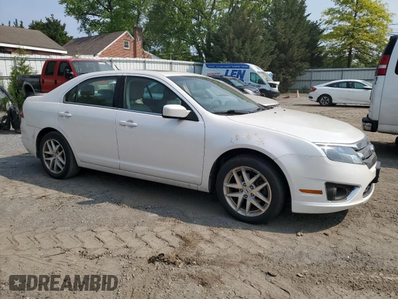 2012 Ford Fusion SEL с VIN 3FAHP0JG5CR357145, выставлен на аукционе Copart как лот 59145085 с пробегом 174 739 миль миль и Списание • Salvage title. История ставок и продаж доступна на DreamBid. Изображение 4.