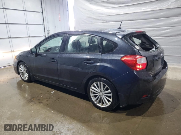 2012 Subaru Impreza Premium with VIN JF1GPAD65CH220163, listed as a Copart auction lot 61016015 with 149,966 mi miles and Salvage title. Bid and sale history available at DreamBid. Image 2.