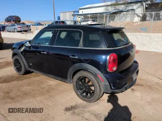 2012 MINI Countryman S with VIN WMWZC5C50CWL63321, listed as a Copart auction lot 52427065 with 126,898 mi miles and Salvage Title. Bid and sale history available at DreamBid. Image 2.