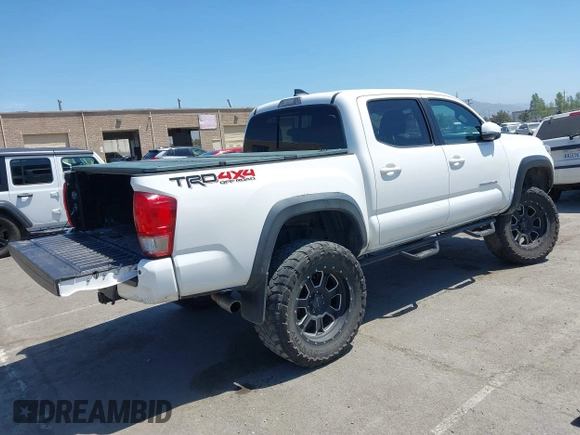 2017 Toyota Tacoma SR5 z VIN 3TMCZ5AN7HM095515, wystawiony jako IAAI lot #42150909 z przebiegiem 70 603 mil mil oraz . Historia ofert i sprzedaży dostępna na DreamBid. Obrazek 4.