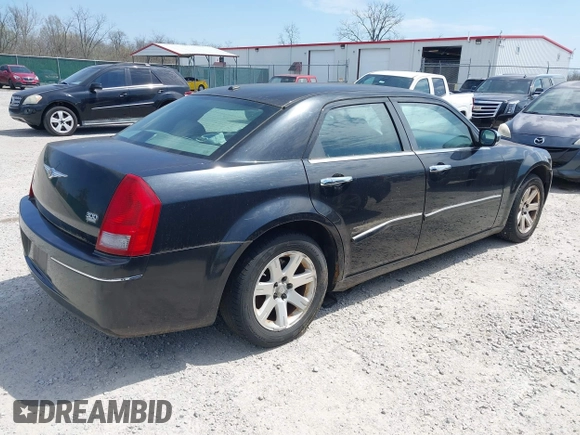 2006 Chrysler 300 Touring with VIN 2C3LA53G66H329729, listed as a IAAI auction lot 41946723 with 134,465 mi miles. Bid and sale history available at carsss.com. Image 4.