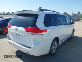 2014 Toyota Sienna LE AAS with VIN 5TDKK3DC4ES515791, listed as a IAAI auction lot 42304201 with 113,139 mi miles and . Bid and sale history available at DreamBid. Image 4.