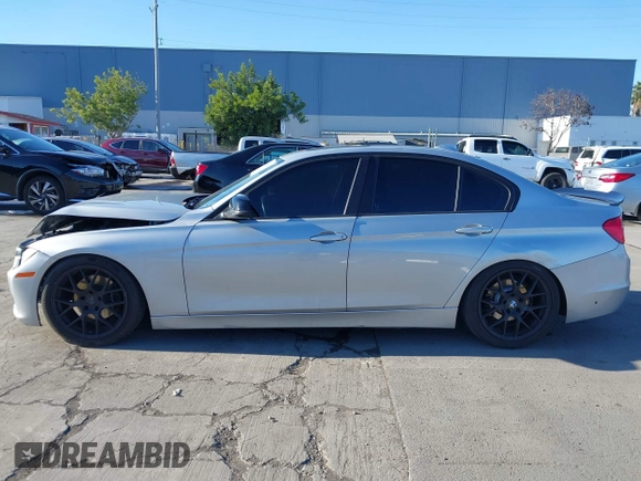 2015 BMW 3 Series 328i with VIN WBA3A5C57FF609054, listed as a IAAI auction lot 41330498 with 129,378 mi miles. Bid and sale history available at carsss.com. Image 14.