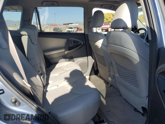 2010 Toyota RAV4 Limited with VIN JTMYK4DV1AD003591, listed as a Copart auction lot 61499555 with 100,940 mi miles and Salvage title. Bid and sale history available at DreamBid. Image 11.