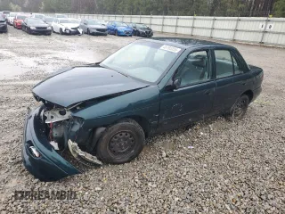 1996 Kia Sephia RS with VIN KNAFA1256T5265533, listed as a Copart auction lot 48195555 with 225,062 mi miles and Salvage Title. Bid and sale history available at DreamBid. Image 1.