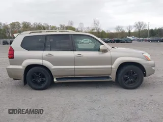 2003 Lexus GX 470 z VIN JTJBT20X230003105, wystawiony jako IAAI lot #42063855 z przebiegiem 204 004 mil mil oraz . Historia ofert i sprzedaży dostępna na DreamBid. Obrazek 13.