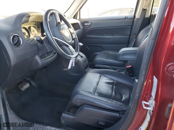 2016 Jeep Patriot Latitude with VIN 1C4NJRFB0GD511307, listed as a Copart auction lot 84235204 with 98,557 mi miles and Salvage Title. Bid and sale history available at carsss.com. Image 7.