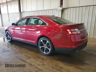 2015 Ford Taurus SEL with VIN 1FAHP2E83FG143653, listed as a Copart auction lot 59280645 with 77,048 mi miles and Salvage title. Bid and sale history available at DreamBid. Image 2.