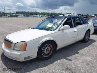 2002 Cadillac DeVille with VIN 1G6KD54Y72U128650, listed as a IAAI auction lot 40303319 with 42,972 mi miles. Bid and sale history available at carsss.com. Image 17.