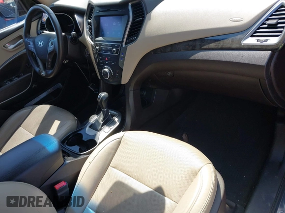 2017 Hyundai Santa Fe 2.4L z VIN 5XYZU3LB4HG462058, wystawiony jako IAAI lot #41861190 z przebiegiem 87 102 mil mil oraz . Historia ofert i sprzedaży dostępna na DreamBid. Obrazek 5.