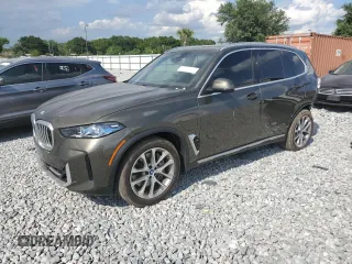 2024 BMW X5 xDrive50e z VIN 5UX43EU07R9S85366, wystawiony jako Copart lot #54894225 z przebiegiem 21 712 mil mil oraz Szkody całkowita. Historia ofert i sprzedaży dostępna na DreamBid. Obrazek 1.