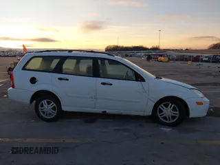 2001 Ford Focus SE with VIN 1FAFP36341W164123, listed as a IAAI auction lot 41143386 with 107,477 mi miles and . Bid and sale history available at carsss.com. Image 14.