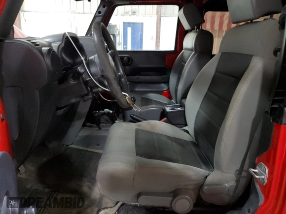 2009 Jeep Wrangler X с VIN 1J4FA24179L734789, выставлен на аукционе Copart как лот 54131245 с пробегом 98 239 миль миль и Списание • Salvage title. История ставок и продаж доступна на DreamBid. Изображение 7.