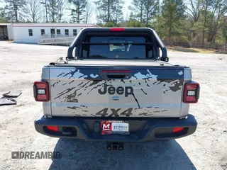 2021 Jeep Gladiator Freedom with VIN 1C6HJTAG3ML540967, listed as a IAAI auction lot 41883858 with 92,287 mi miles and . Bid and sale history available at DreamBid. Image 16.