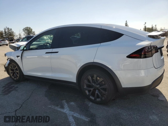 2023 Tesla Model X with VIN 7SAXCDE52PF378496, listed as a Copart auction lot 49455825 with Not Provided miles and Salvage Title. Bid and sale history available at DreamBid. Image 2.