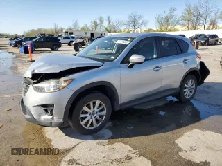 2016 Mazda CX-5 Touring with VIN JM3KE2CY8G0614335, listed as a Copart auction lot 52124465 with 218,320 mi miles and Salvage Title. Bid and sale history available at carsss.com. Image 1.