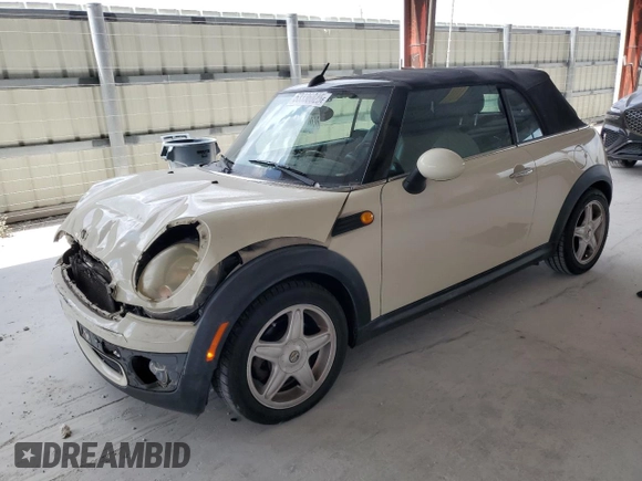 2010 MINI Convertible with VIN WMWMR3C59ATU98597, listed as a Copart auction lot 53336025 with 88,273 mi miles and Salvage Title. Bid and sale history available at DreamBid. Image 1.