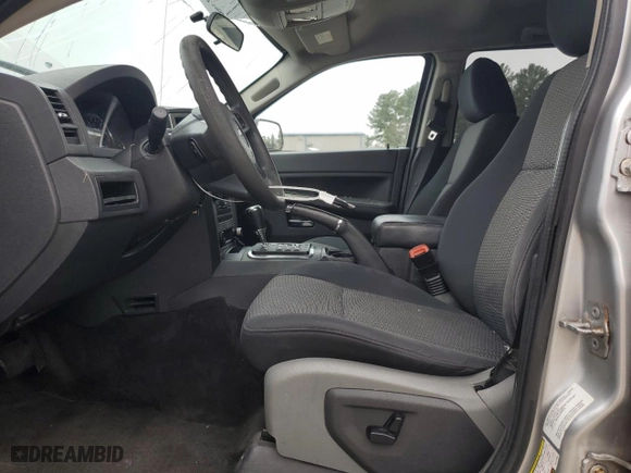 2010 Jeep Grand Cherokee Laredo with VIN 1J4PR4GK0AC137954, listed as a Copart auction lot 51131445 with 151,477 mi miles and Clean Title. Bid and sale history available at carsss.com. Image 7.
