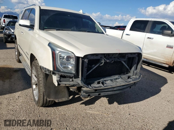 2015 GMC Yukon Denali with VIN 1GKS2CKJ0FR508598, listed as a Copart auction lot 71212924 with 133,220 mi miles and Salvage Title. Bid and sale history available at carsss.com. Image 5.