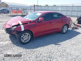 2011 Kia Optima LX z VIN KNAGM4A76B5072989, wystawiony jako IAAI lot #42296570 z przebiegiem 70 500 mil mil oraz . Historia ofert i sprzedaży dostępna na DreamBid. Obrazek 2.