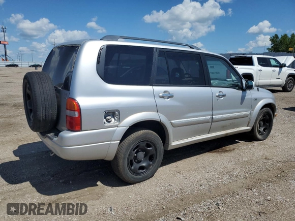2002 Suzuki XL7 Standard z VIN JS3TX92V224107201, wystawiony jako Copart lot #61142394 z przebiegiem Nie podano mil oraz Szkoda całkowita • Salvage title. Historia ofert i sprzedaży dostępna na DreamBid. Obrazek 3.